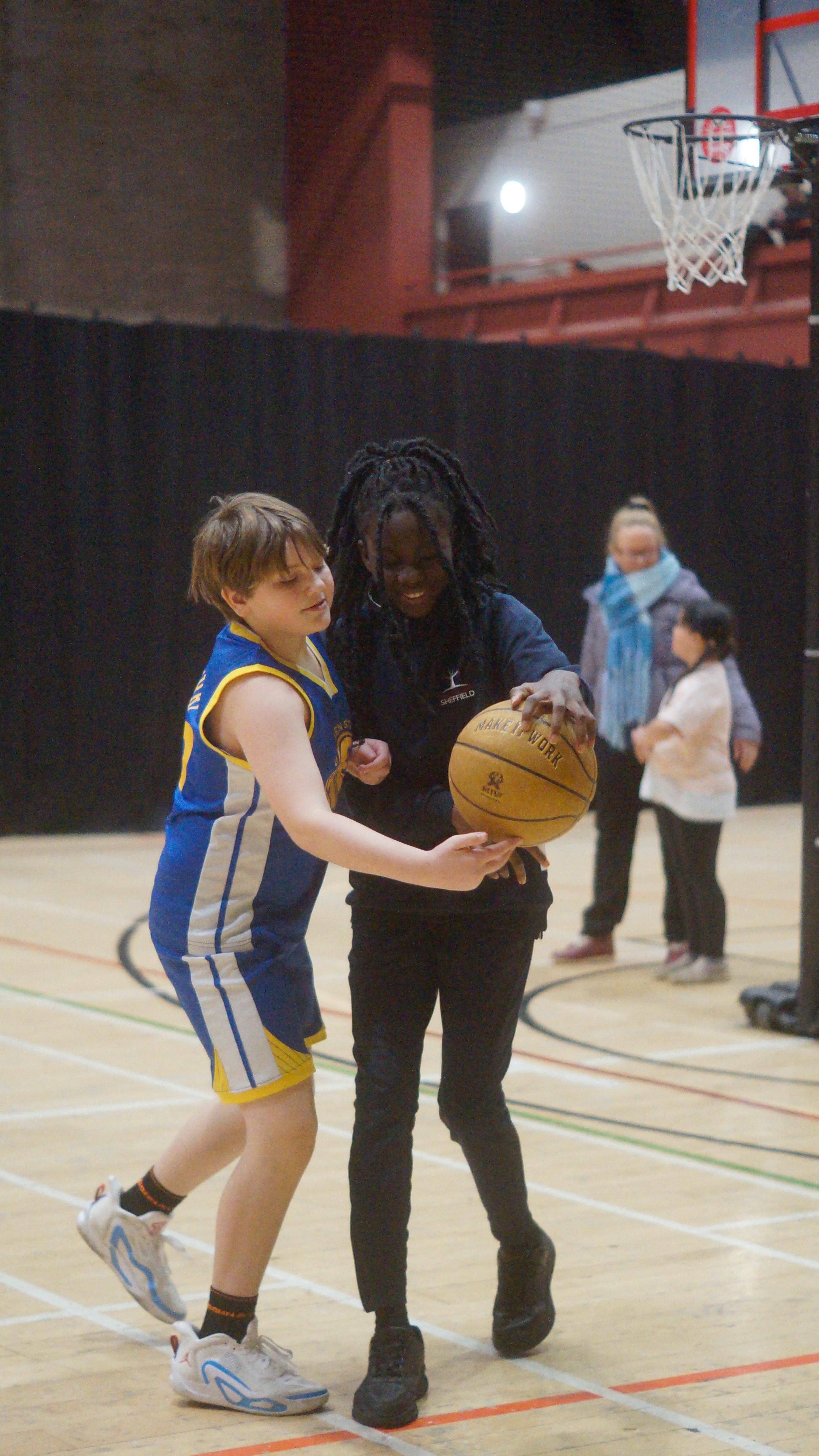 Coach with young player